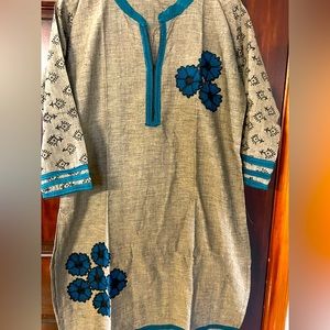 Beautiful knee length top with flower embroidery